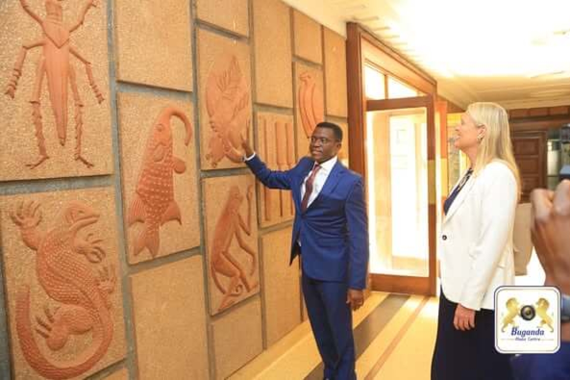 Katikkiro Charles Peter Mayiga gives H.E. Lisa Chesney a guided tour of Bulange, highlighting its historical significance Katikkiro Charles Peter Mayiga gives H.E. Lisa Chesney a guided tour of Bulange, highlighting its historical significance